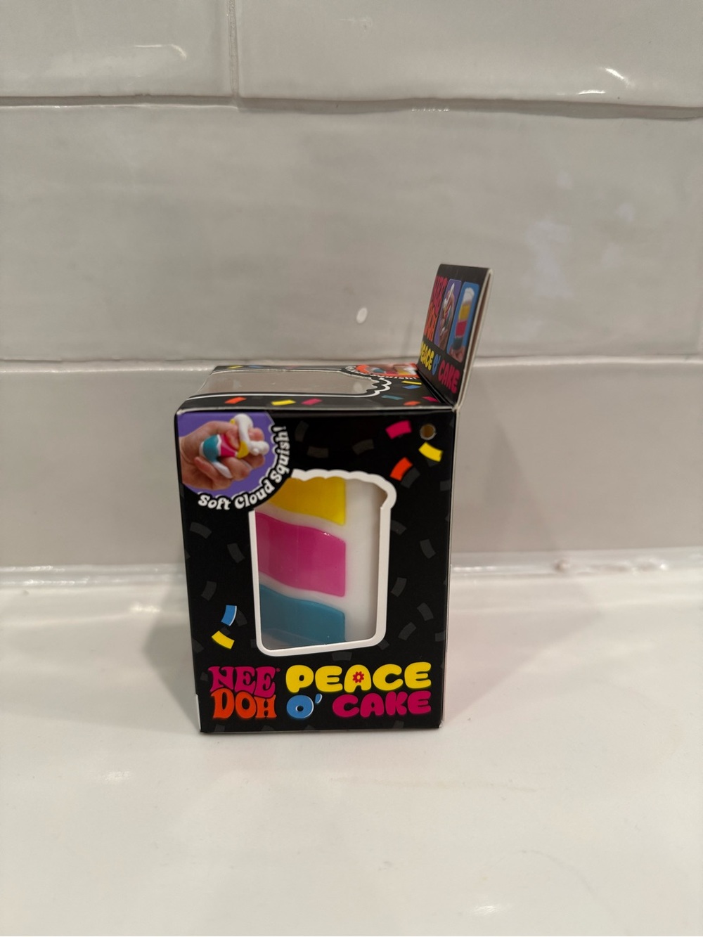 Nee Doh Peace O' Cake Squeeze Toy - Yellow Pink Blue